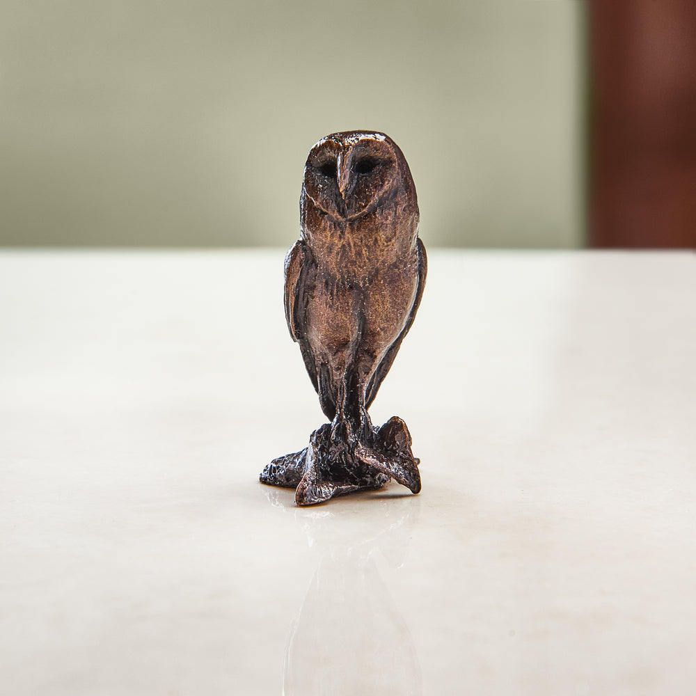 Miniature bronze figurine of a wide-eyed barn owl. A perfect bronze anniversary gift.
