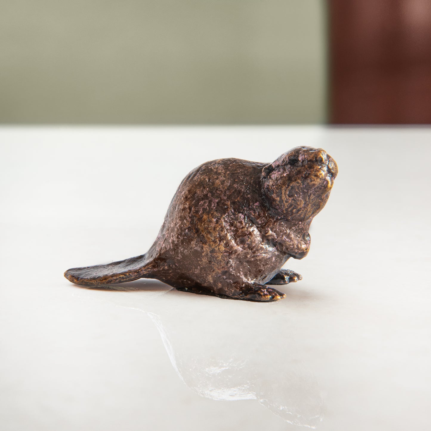 
                  
                    Miniature bronze figurine of a beaver to give as a bronze anniversary gift or thoughtful birthday gift.
                  
                