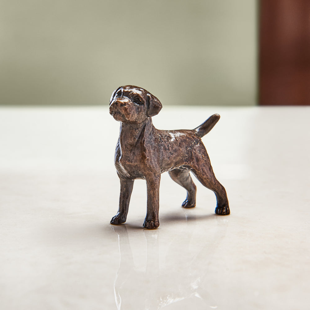 Miniature bronze figurine of a border terrier. A thoughtful bronze anniversary gift or birthday gift for dog lovers