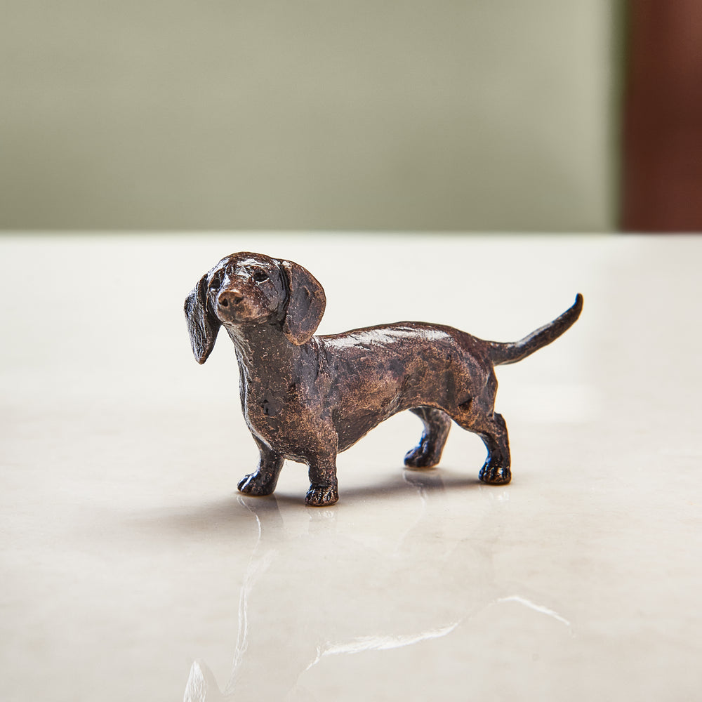 Miniature bronze figurine of a dachshund. A thoughtful bronze anniversary gift or birthday gift for dog lovers.