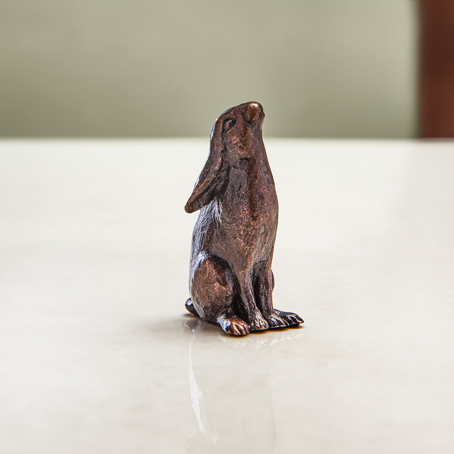 
                  
                    Miniature bronze figurine of a moon gazing hare. Give as a bronze anniversary gift or thoughtful Christening gift.
                  
                