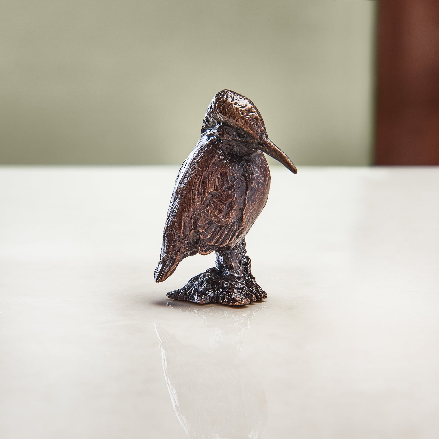 
                  
                    Miniature bronze figurine of a kingfisher. Give as a bronze anniversary gift or thoughtful birthday gift.
                  
                