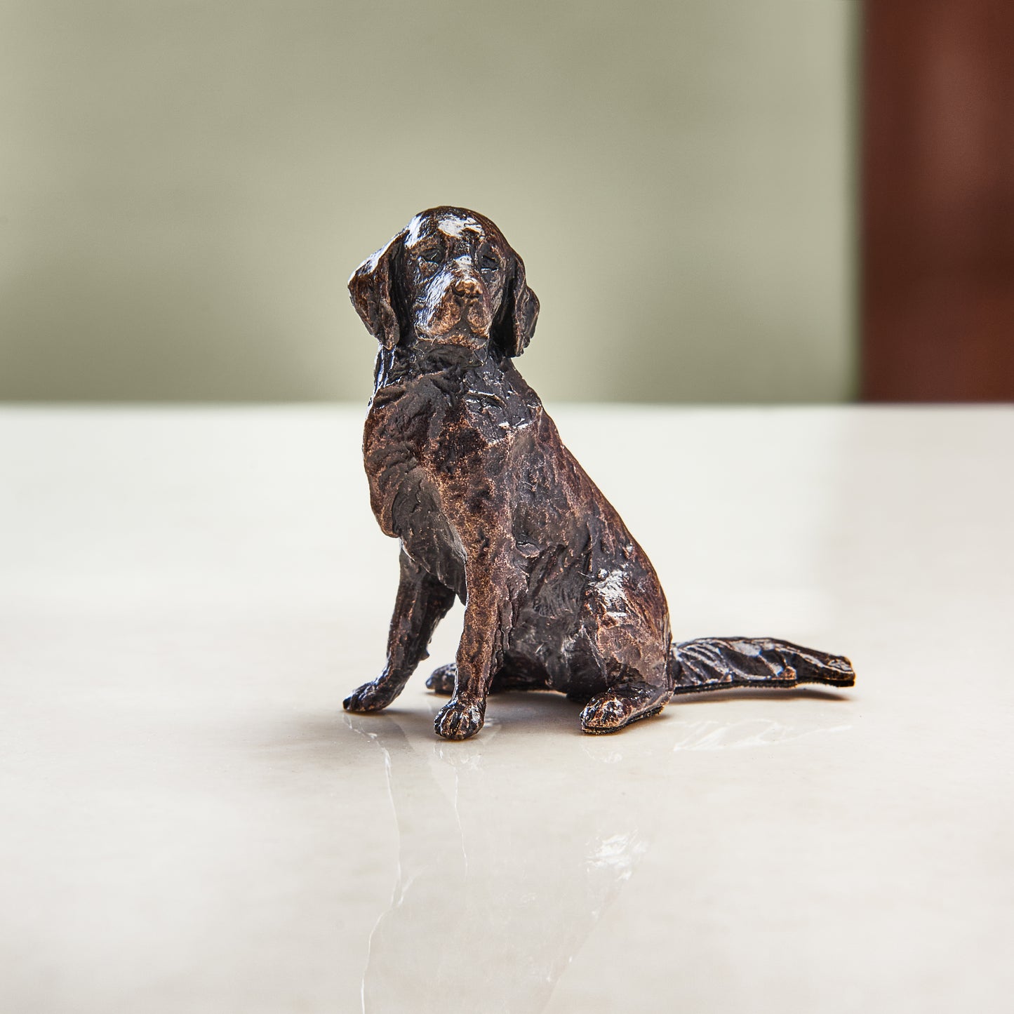 Miniature bronze figurine of a retriever. A thoughtful bronze anniversary gift or birthday gift for dog lovers.