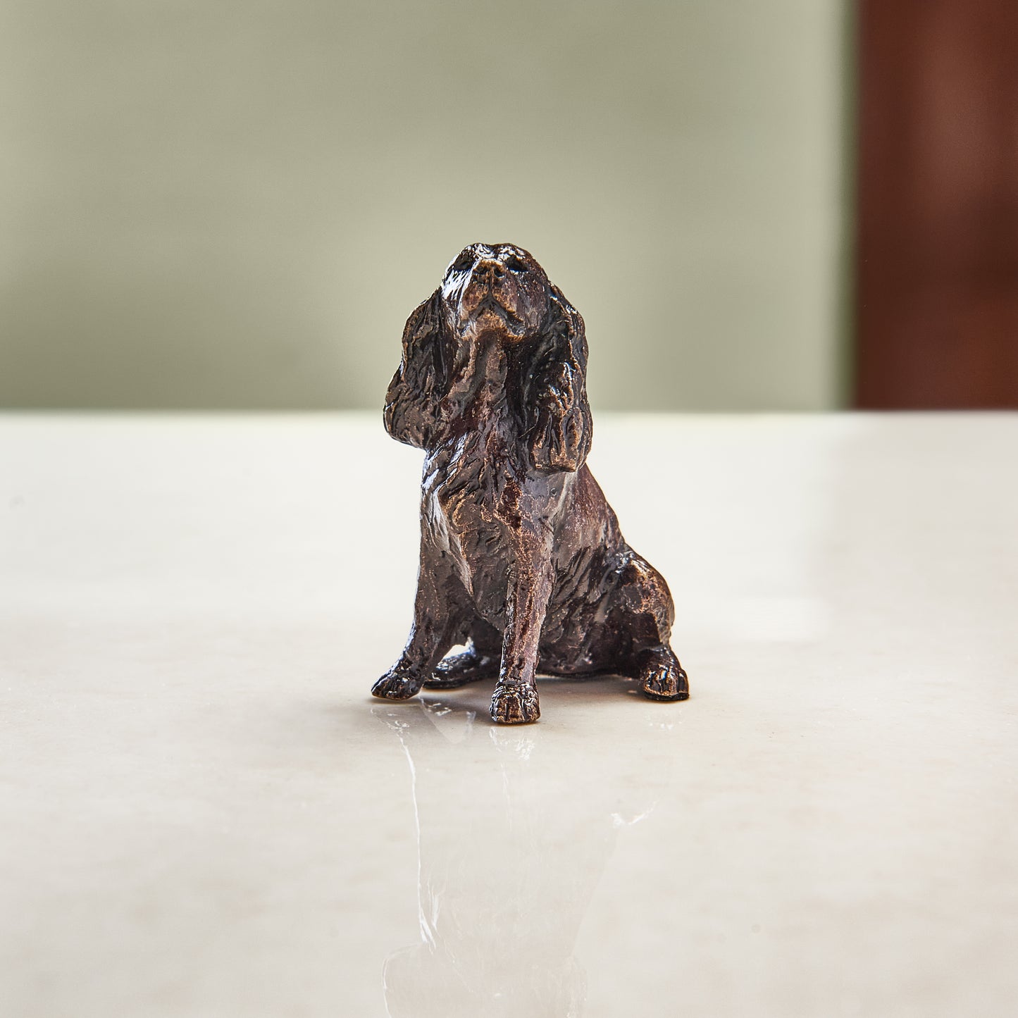 
                  
                    Miniature bronze figurine of a spaniel. A thoughtful bronze anniversary gift for him or her.
                  
                