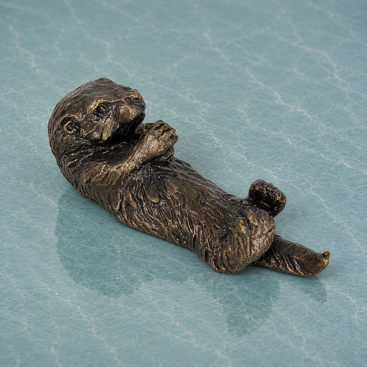 
                  
                    Miniature Bronze Sculpture - Sea Otter
                  
                