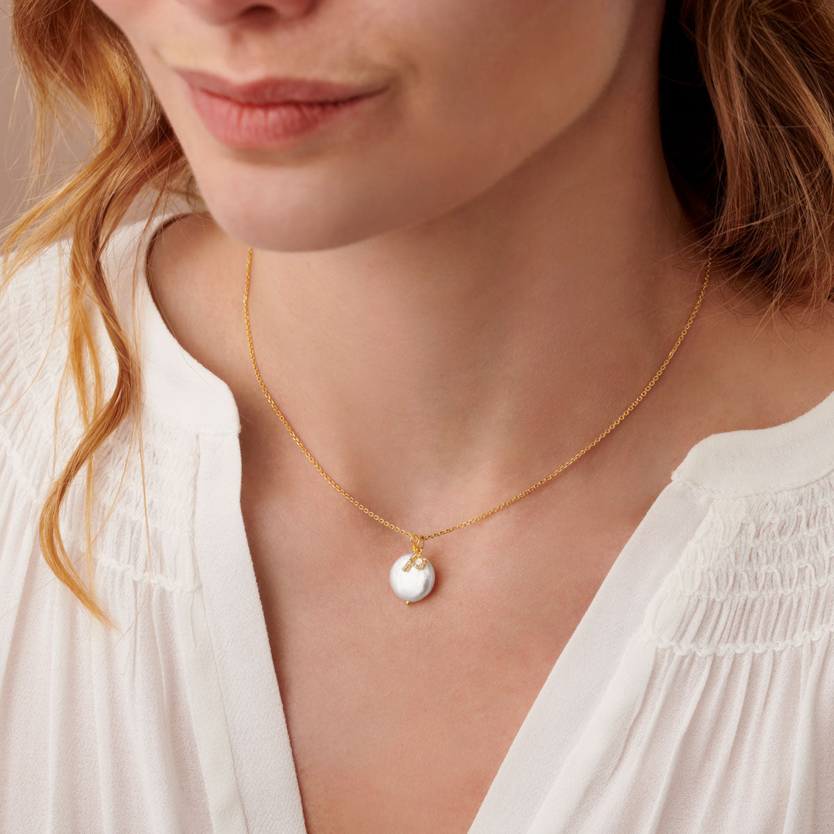 
                  
                    Claudette Worters diamond initial pendant with fresh water pearl on gold chain. Makes the perfect Bridesmaid gift.
                  
                