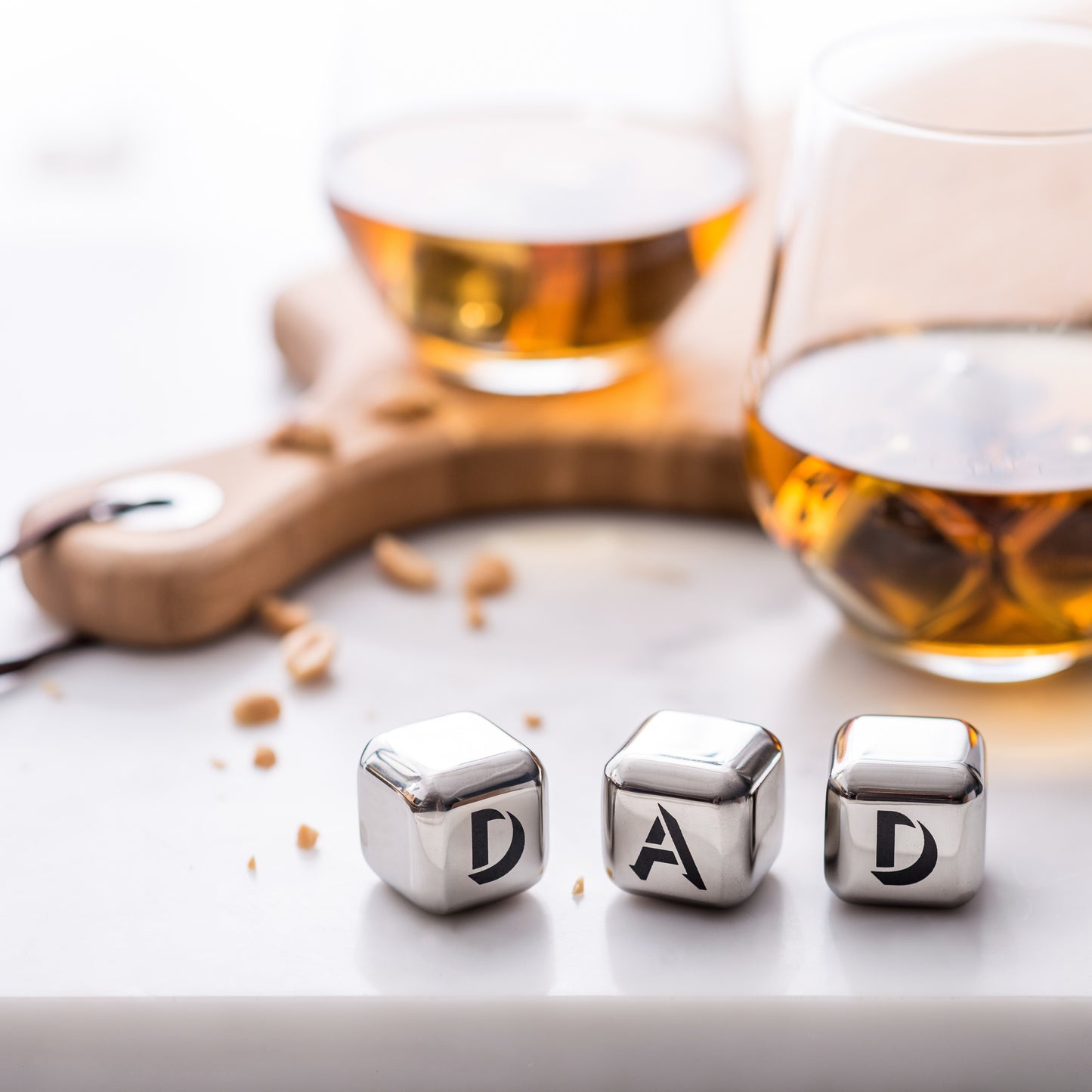 
                  
                    Set of four personalised stainless steel ice cubes. Add initials, names or dates to create a thoughtful birthday or anniversary gift or give a set to dad for Father’s Day.
                  
                