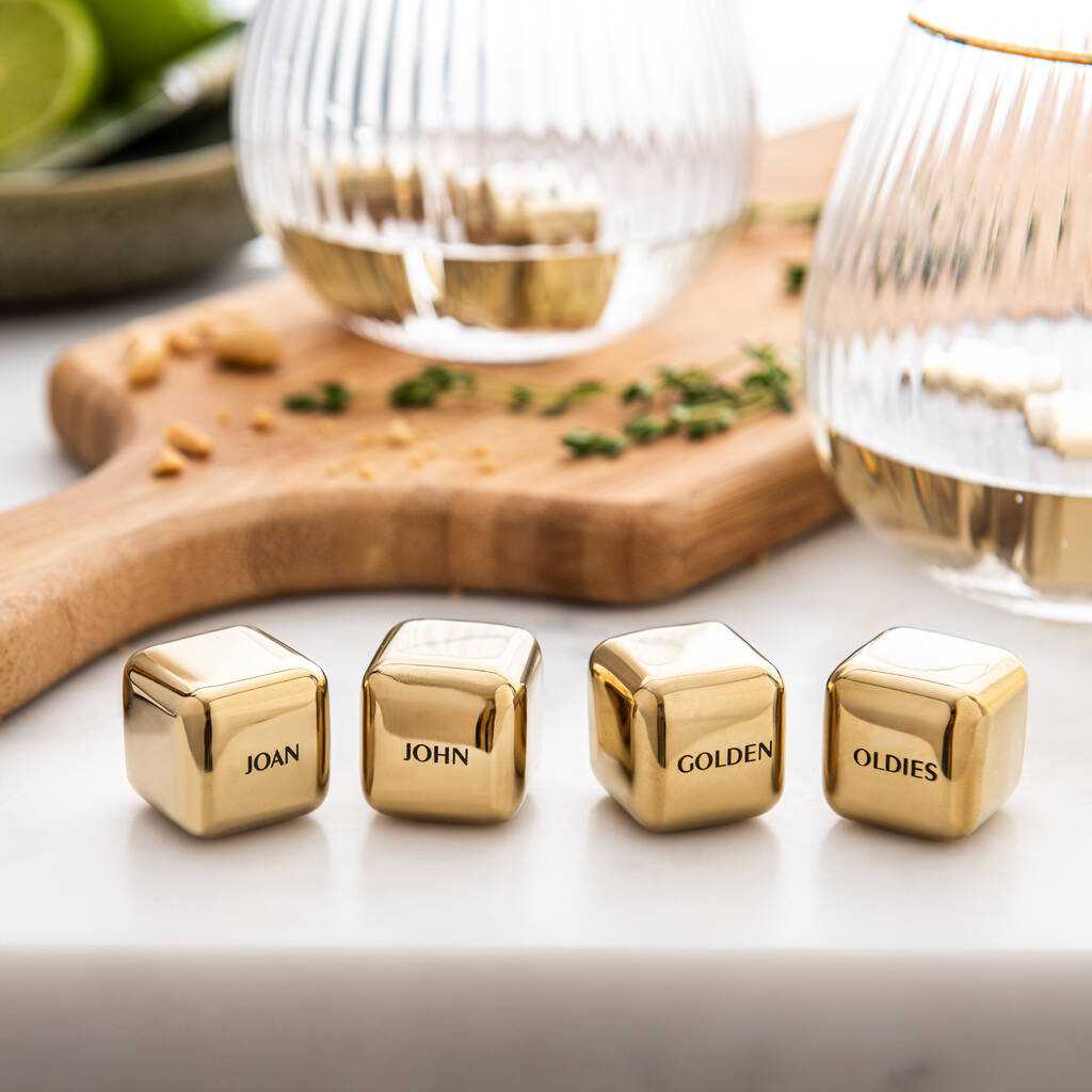 
                  
                    Set of four personalised gold finish stainless steel ice cubes. Add initials, names or dates to create a thoughtful golden wedding anniversary gift.
                  
                