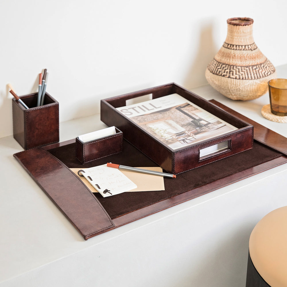 : Luxury desk accessories set in dark brown leather, combining a desk blotter, pen pot, business card holder and A4 leather desk tray. Personalise for a thoughtful and unique gift to celebrate a new job or retirement.