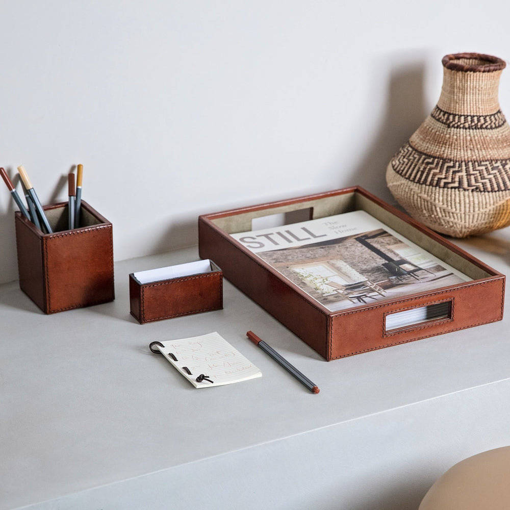 : Luxury desk set in tan leather, combining a stylish pen pot, business card holder and A4 leather desk tray. Personalise for a thoughtful gift to celebrate Father’s Day, a new job or retirement.