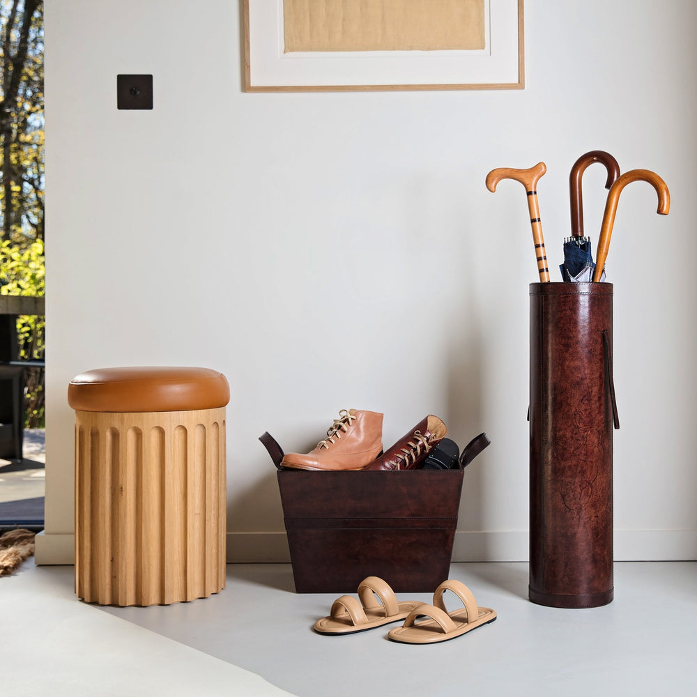 
                  
                    leather stick stand and leather shoe basket by back door
                  
                