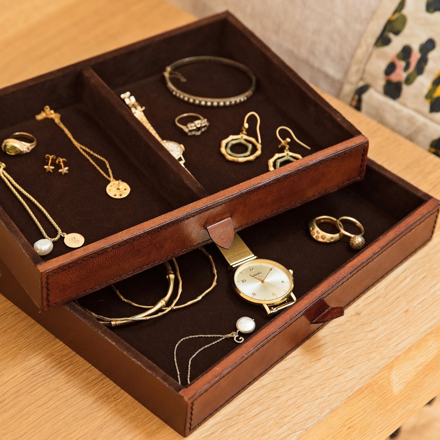 
                  
                    Ladies leather jewellery box holding designs by Claudette Worters.
                  
                