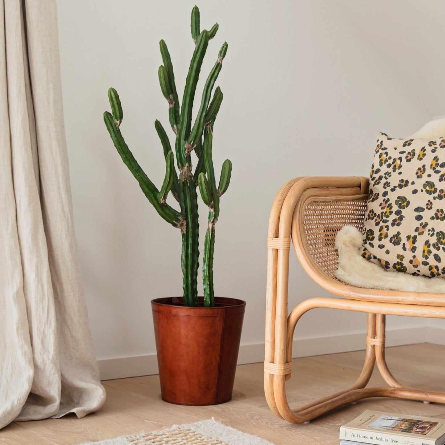 Leather plant pot with removable metal liner for use all over the home. Makes a practical gift for plant mad family and friends.