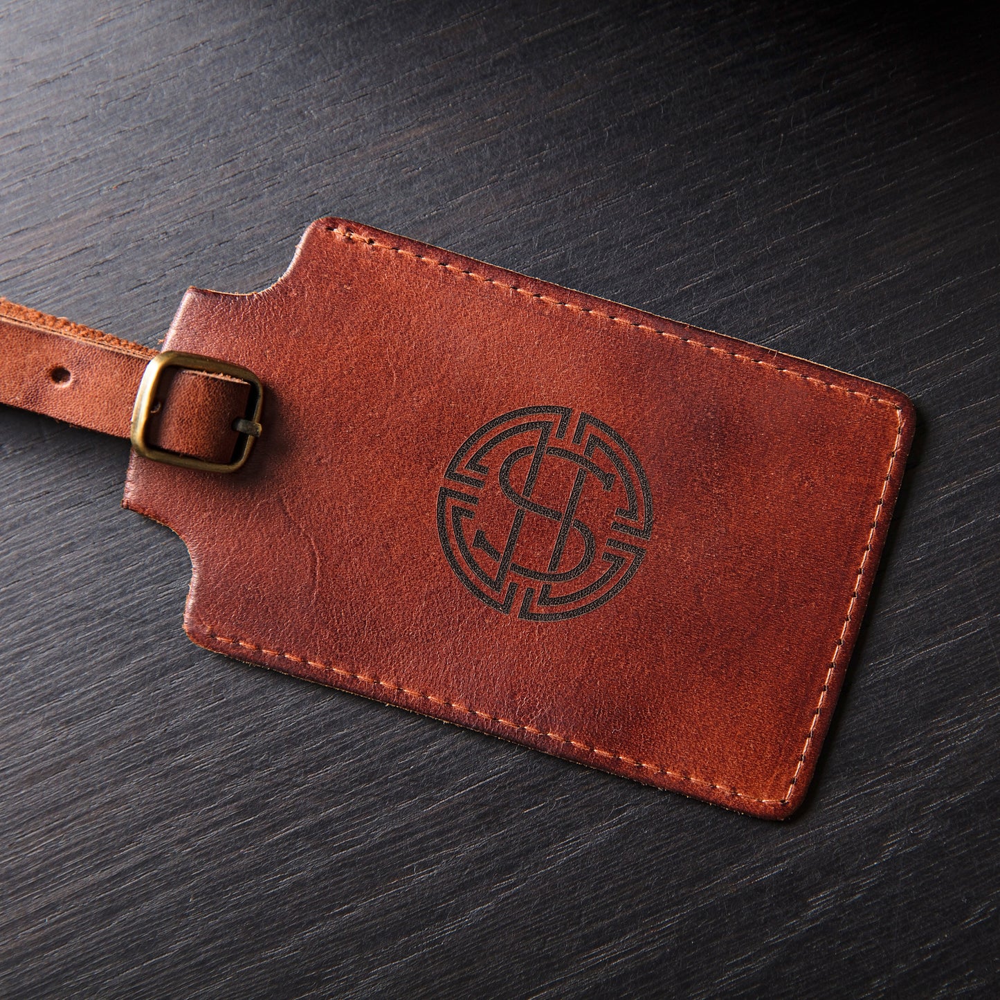 
                  
                    Monogram Leather Luggage Tag
                  
                