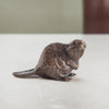 Miniature bronze figurine of a beaver to give as a bronze anniversary gift or thoughtful birthday gift.