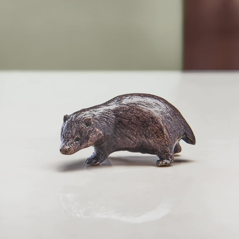 
                  
                    Load and play video in Gallery viewer, Miniature bronze figurine of a badger. Ideal as a bronze anniversary gift or thoughtful birthday gift.
                  
                