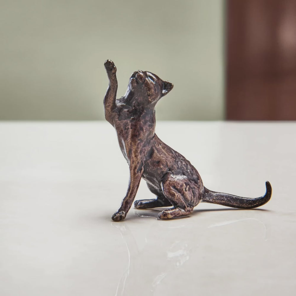 
                  
                    Load and play video in Gallery viewer, Miniature bronze figurine of a cat playfully pawing the air. A perfect bronze anniversary gift.
                  
                
