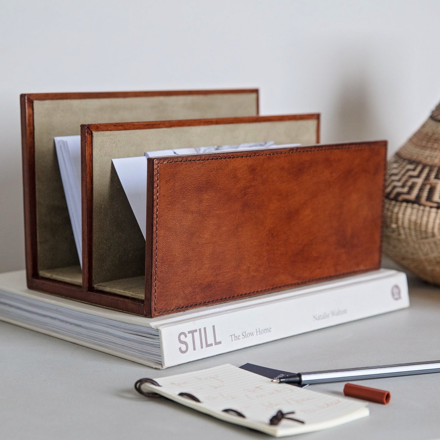 Letter rack in tan leather, with a suede interior. Part of a collection of luxury desk accessories, this makes a stylish and unique new home or wedding gift.