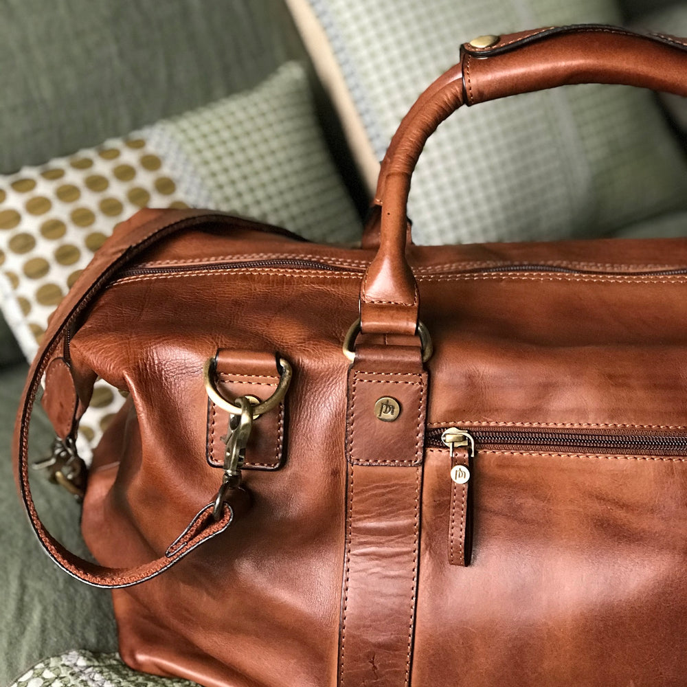 
                  
                    Leather Weekend Bag
                  
                