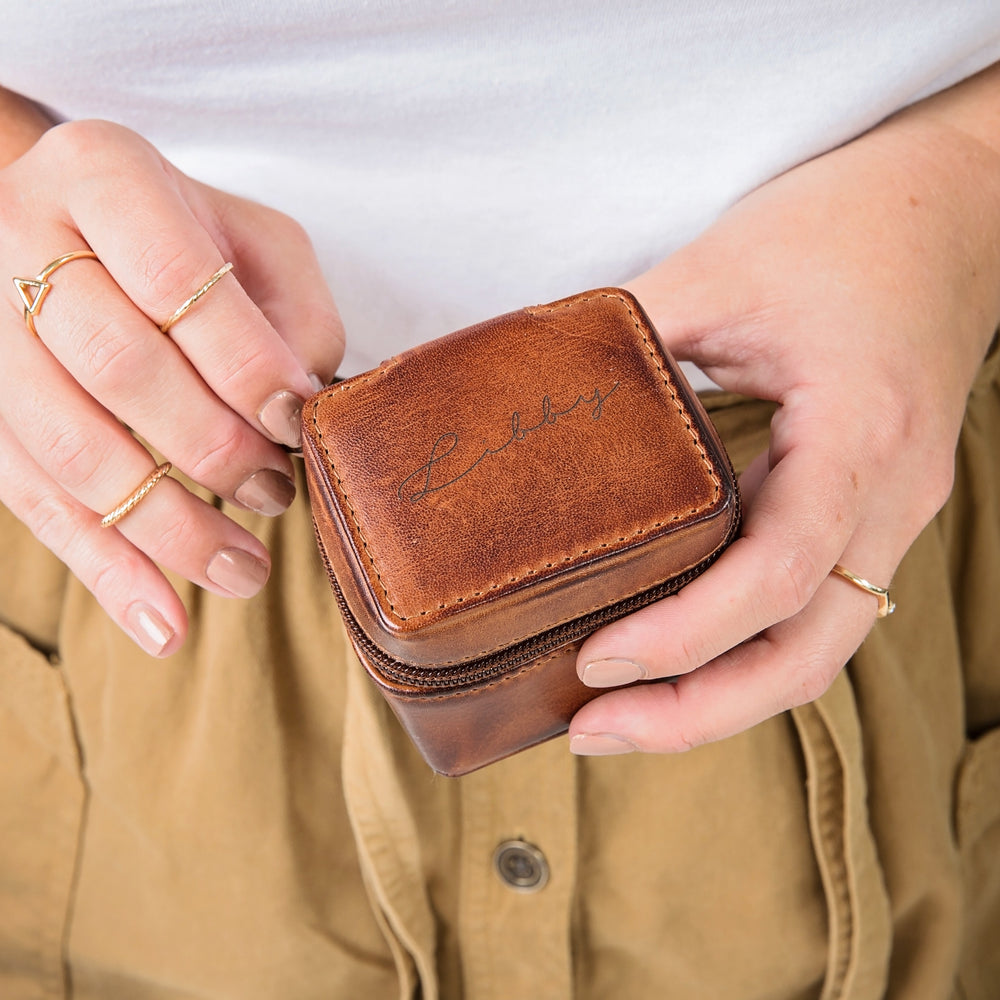 Tan leather travel jewellery box with zip closure. Ideal for small jewellery whilst travelling. Personalise with a name, or date as a thoughtful anniversary or Mother’s Day gift.